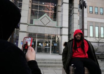 Advocates gather Downtown after autopsy of Sinzae Reed released to family